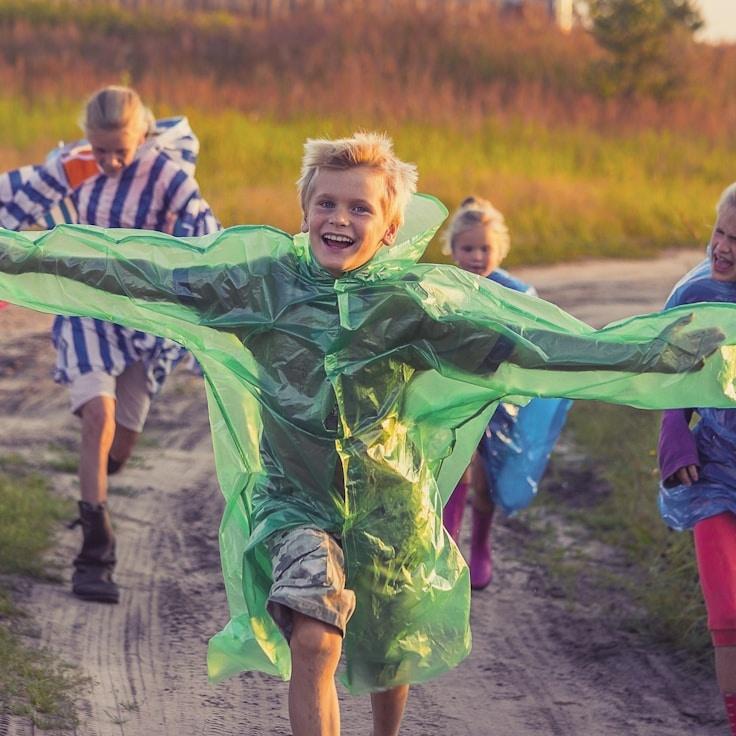 Kaveri Mehta, Lead Design Curator at MeadowLinkStudio, reviewing corporate floral arrangements